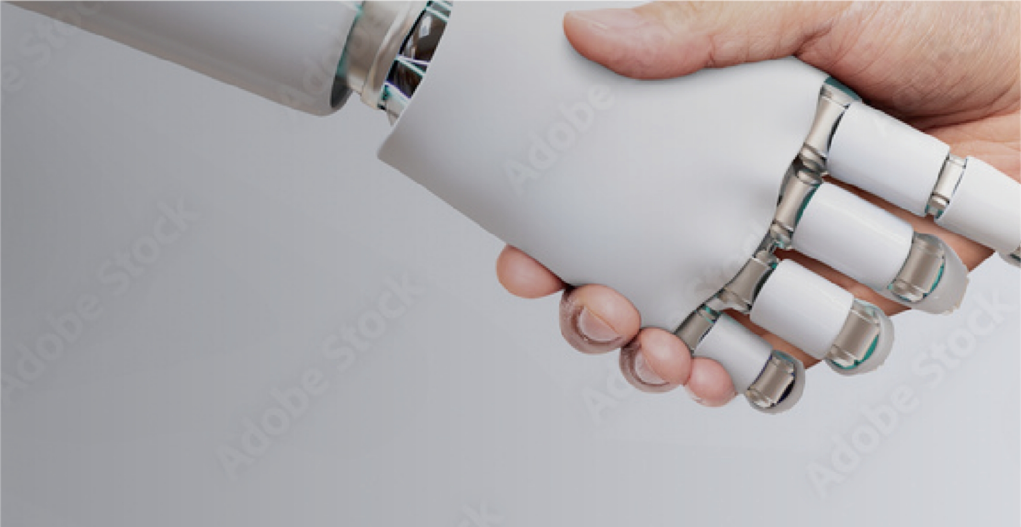 人とロボットが握手する写真